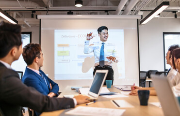 Business man making  presentation in conference room