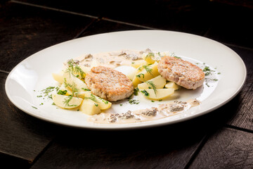 chicken cutlet with potato wedges ready-made dish for the menu