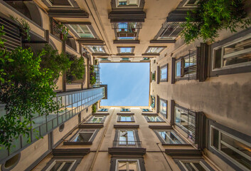 Naples, Italy - one of the main highlights in Naples are the wonderful court yards which can be...