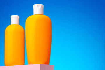 Skincare beauty products container against blue background