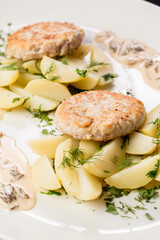 chicken cutlet with potato wedges ready-made dish for the menu