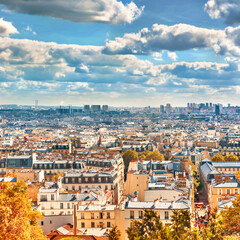 Fototapeta na wymiar City of autumn Paris from Montmartre. Beautiful fall travel cityscape