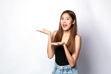 Portrait young beautiful Asian woman happy smile on isolated white background. Beautiful Asian girl smiling and with hand sign and copy space. Casual woman, Asian student smiling looking happy.