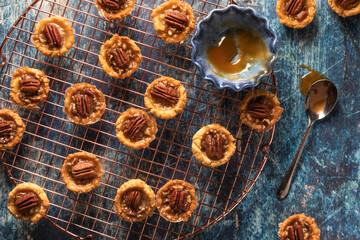 Top down view of mini butter pecan tartlets ready for eating.