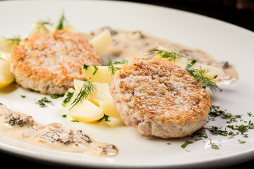 chicken cutlet with potato wedges ready-made dish for the menu