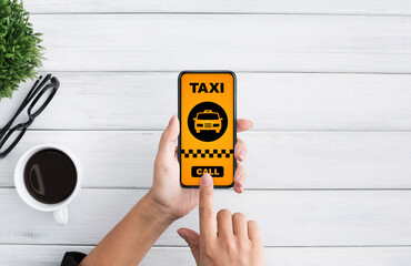 Woman holding smartphone with taxi app interface