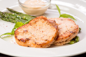 crab cutlets with asparagus and basil