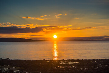 Fototapeta premium Sunset in the bay of Hualaihué, Los Lagos, Chile.
