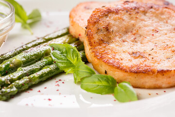 crab cutlets with asparagus and basil