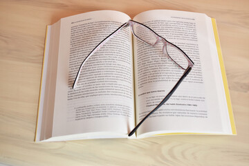 glasses on book