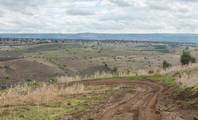 Dirt road with  mud after rain in the Golan Heights in northern Israel