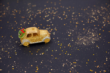 Golden toy car, Christmas or Happy New year 2021
