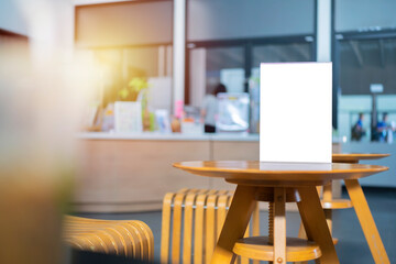 Mock up Menu frame on Table in Bar restaurant cafe, coffee shop.