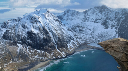 Scenic view of Kvalvika beach on the Lofoten Islands in Northern Norway from a cliff above
