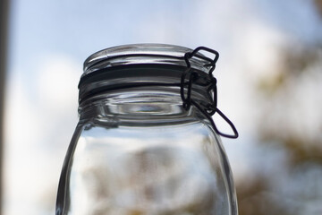 Glass jar. Jar for storing spices. Clear glass. Jar with a vacuum lid.