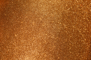 Blurred Brown sparkles, de-focused christmas lights background,