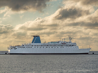 Passenger ship anchored in port. Sea transport for cruise travel