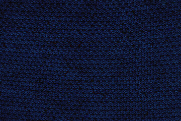 Dark blue knitted fabric texture. Rough sweater background