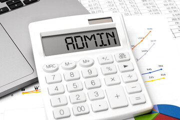 Text ADMIN. Calculator, laptop and paper with charts. Business and tax concept.