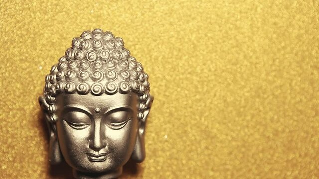 footage of buddha gold background 