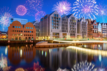 Fototapeta na wymiar New year celebrate fireworks over Old Town of Gdansk. Poland, Europe