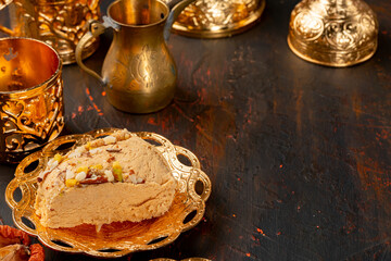 Piece of turkish halva on metal plate