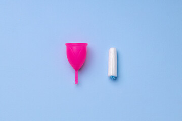 Top view of menstrual cup and medical tampon