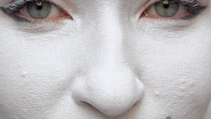 Close up portrait of a mime girl