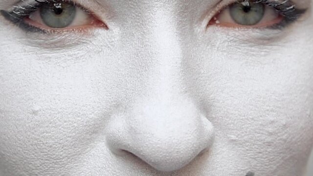 Close up portrait of a mime girl