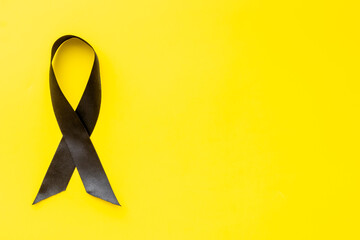 Melanoma awareness black ribbon. Mourning concept