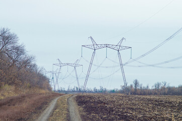 large power line towers against the sky