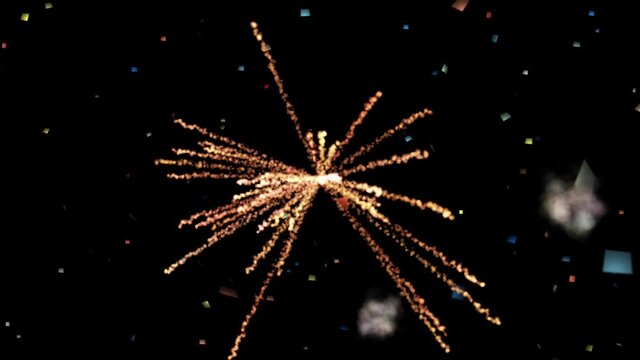 Abstract fireworks from flying particles on a black background in outer space, reminiscent of a festive fireworks display for Christmas, New Year. Beauty and good mood.