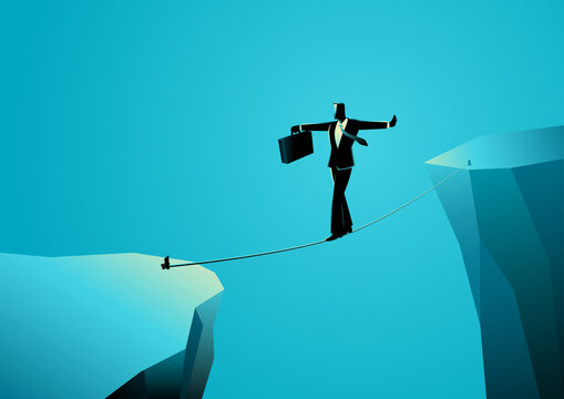 Businessman walking on rope