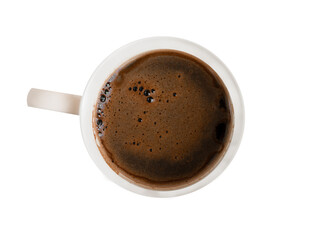 A mug of strong black coffee with foam in a white mug. On a white isolated background. Top view