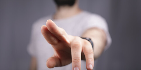 Obraz premium young man finger pointing touch modern