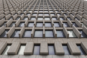 Looking up at a tall building with interesting patterned architecture in downtown Atlanta Georgia