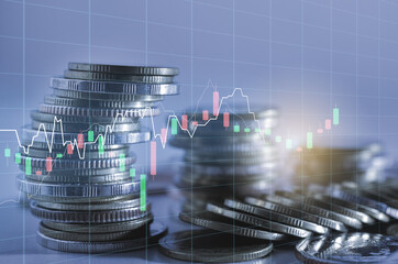 financial investment business concept with coin stack and stock market graph and forex trading growth chart.