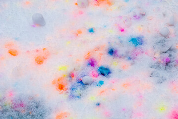 Abstraction colored spots on fresh snow.