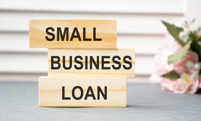 small business loan - word on wooden block