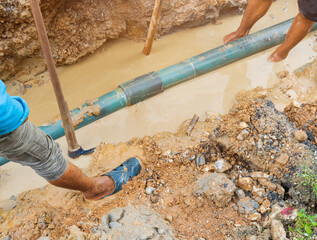 plumber dig repair main plumbing  PVC pipe on road