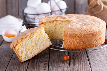 Homemade round sponge cake or chiffon cake on the grate so soft and delicious with ingredients:...