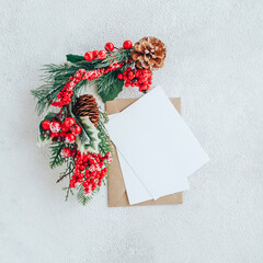 Blank card on white background with spruce branch. Flat lay composition with copy space. - 396823364