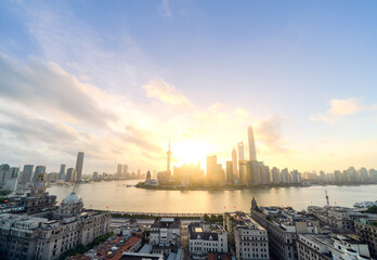 Shanghai skyline and cityscape at sunrise.