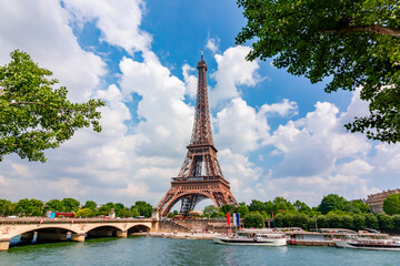 Fototapeta na wymiar Scenic view of Eiffel Tower and Pont d'Iéna bridge in Paris, France