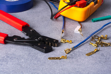 Tools and materials for stripping and crimping the tips of stranded electrical wires