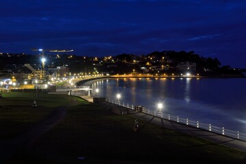 Fototapeta premium The Trestraou beach of Perros-Guirec in the night