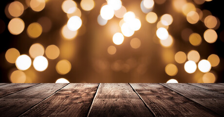 Wooden holiday empty table, night view, blurred bokeh lights background.