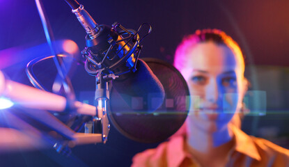 Young radio host in the radio broadcasting station