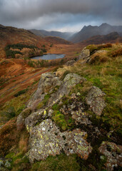 Dramatic weather on a rainy morning in the Lake District National Park. Overlooking the Langdale Pikes and Blea Tarn.