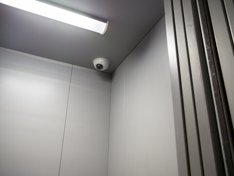CCTV camera is installed on the ceiling of the elevator car